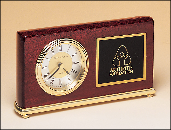 Rosewood Piano Finish Desk Clock on a Brass Base.
